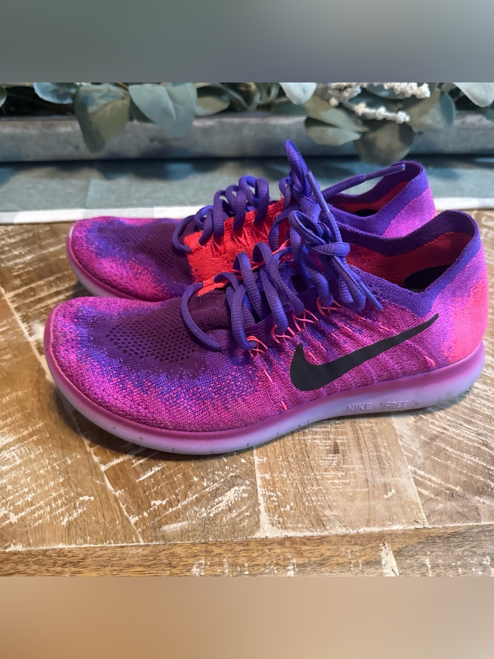 Nike Women’s Purple and Pink Flyknit Athletic Shoes